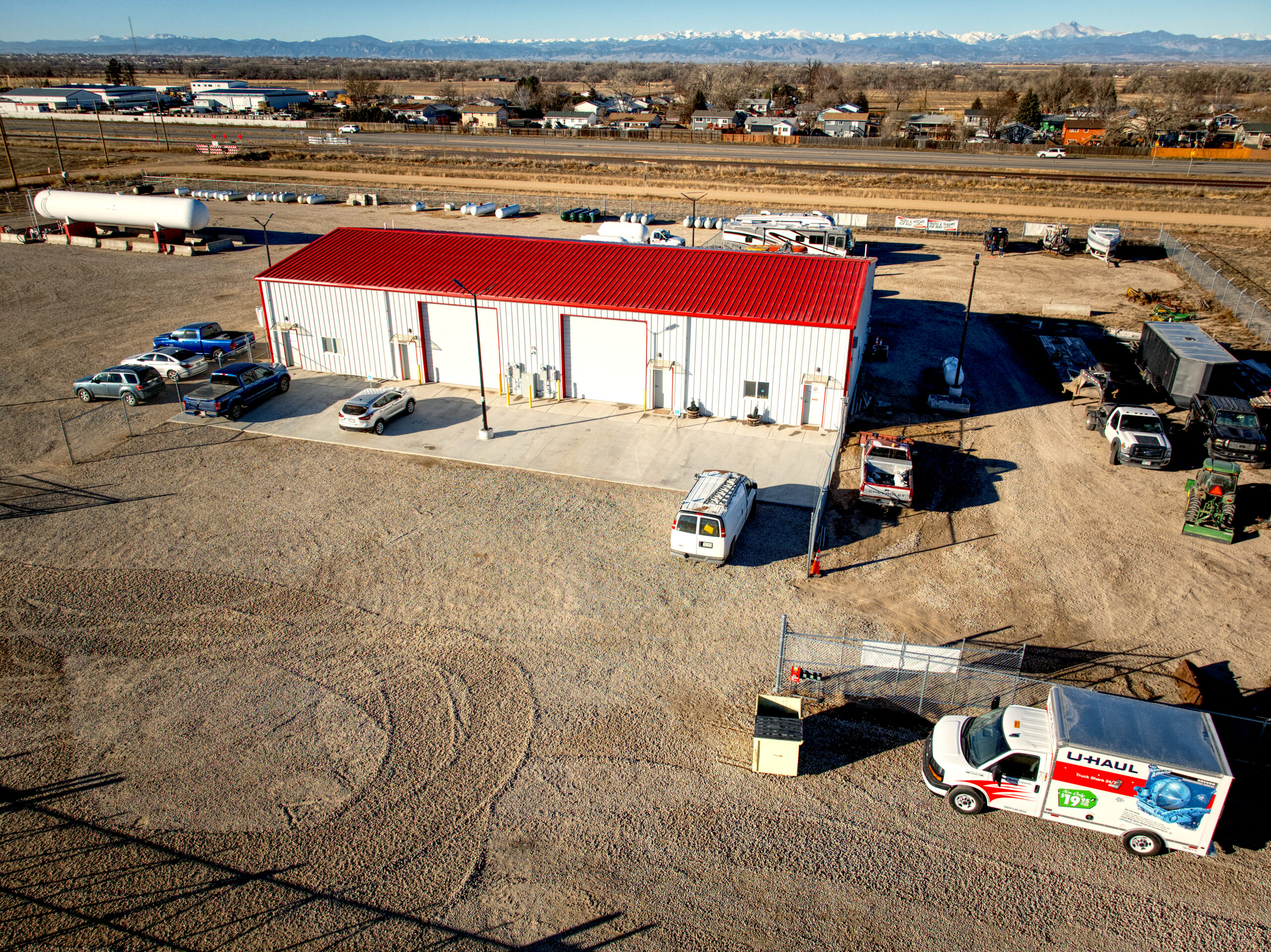 66 and 85 facility with Rocky Mountains in background